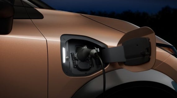 Close-up image of charging cable plugged in | Benton Nissan Bessemer in Bessemer AL